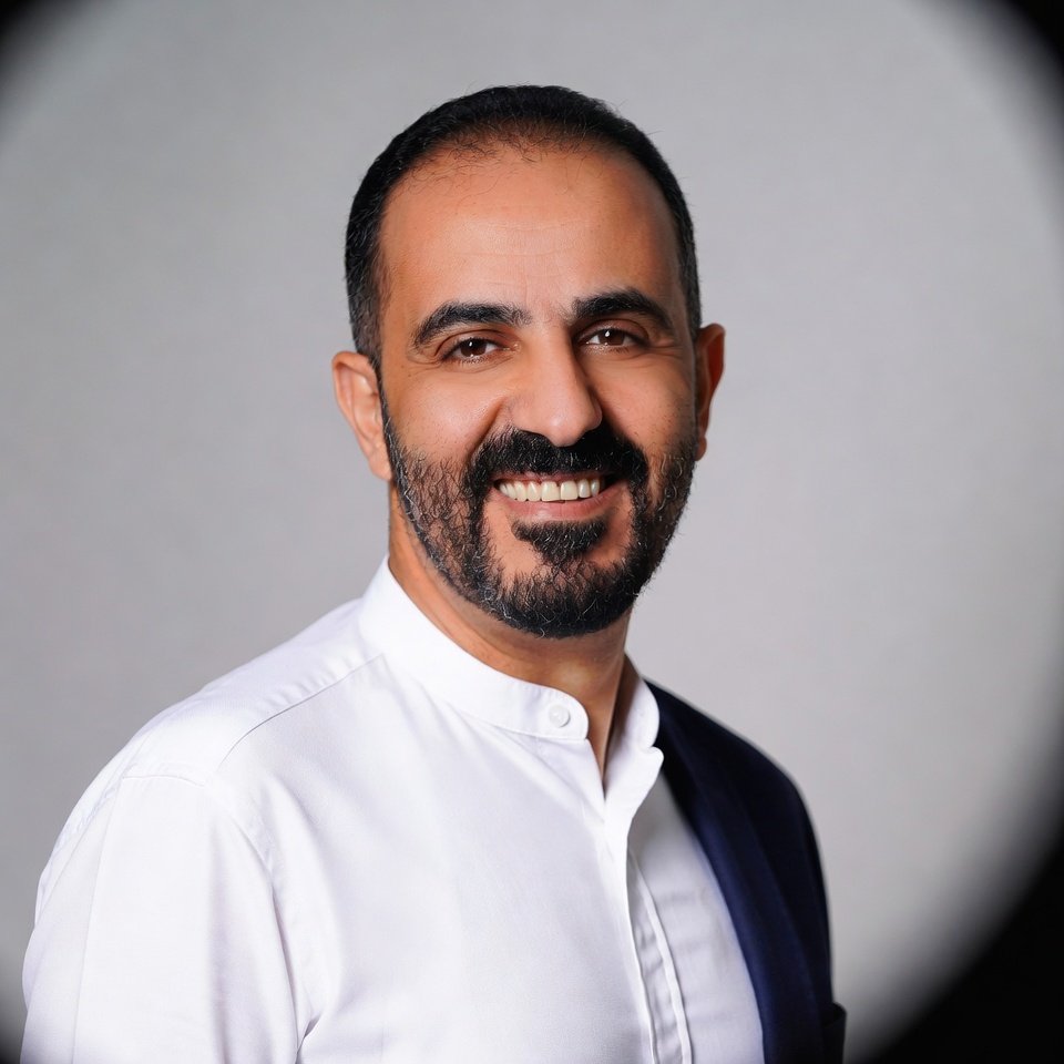 Portrait of Ahmed K., CEO of a luxury real estate company in Dubai